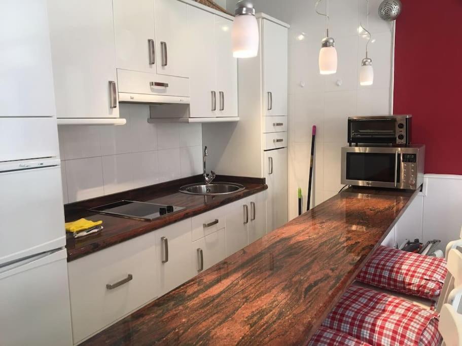 Apartamentos Rio Marinas 15 Playazo Beach ネルハ エクステリア 写真